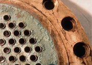 Galvanic corrosion of NAB tube sheet with titanium tubes.