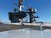 Primer application on the USS Carl Vinson CVN-70 wire area. Photo courtesy of Hugo Machuca.
