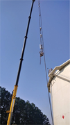 Intero Integrity’s E350 robot and floaters being lifted onto a tank roof.